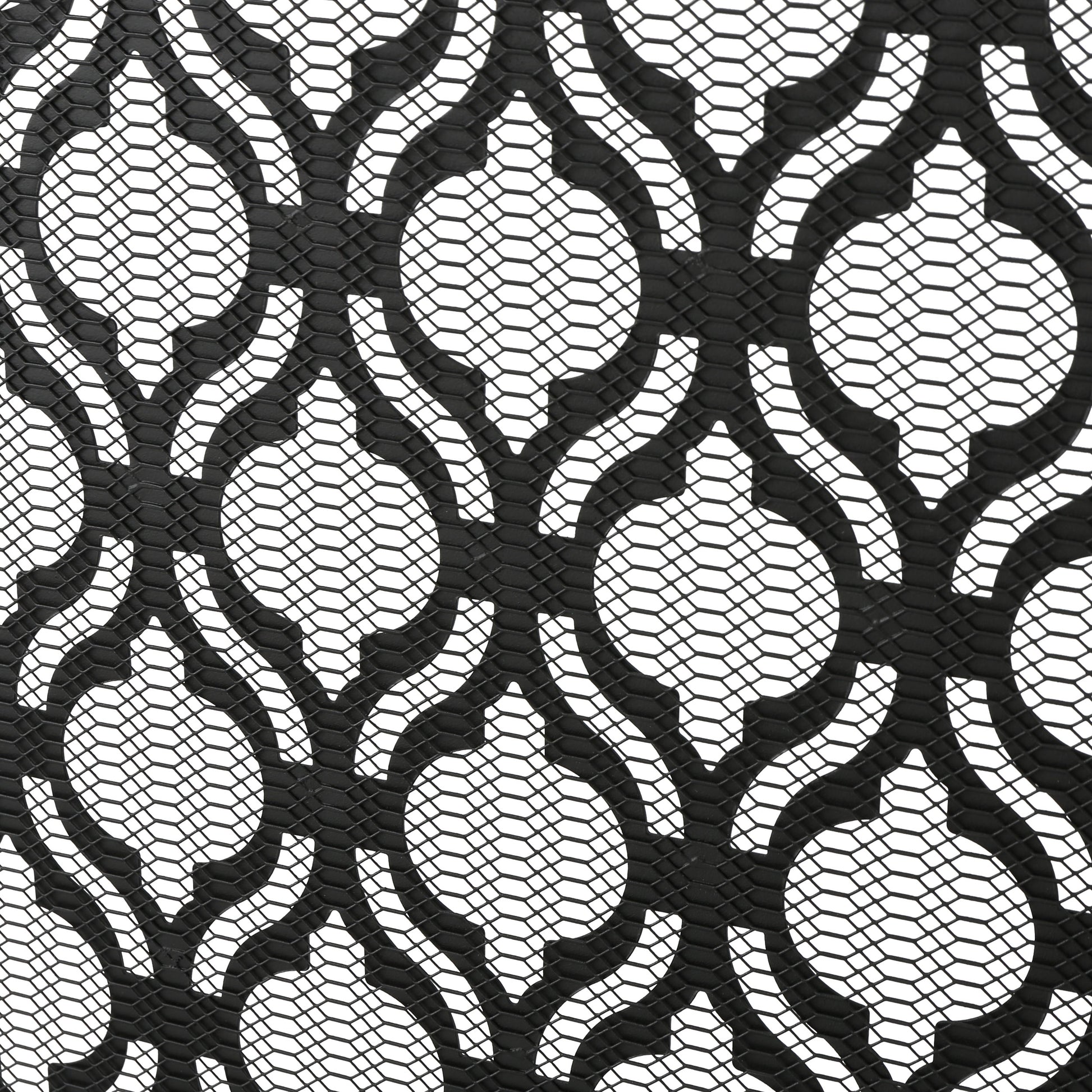 Decorative black metal mesh with an ornate quatrefoil pattern