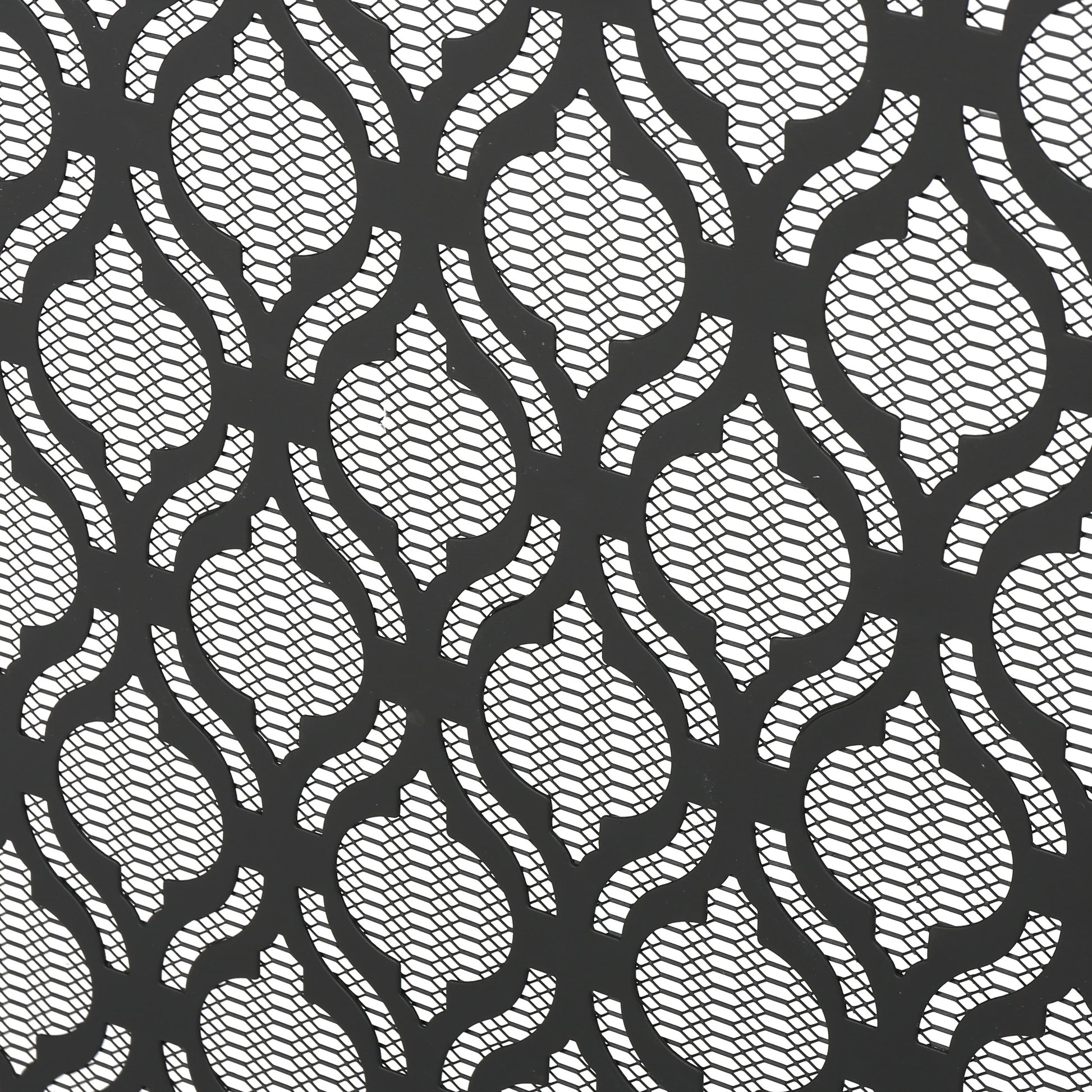 Black decorative metal screen with honeycomb pattern
