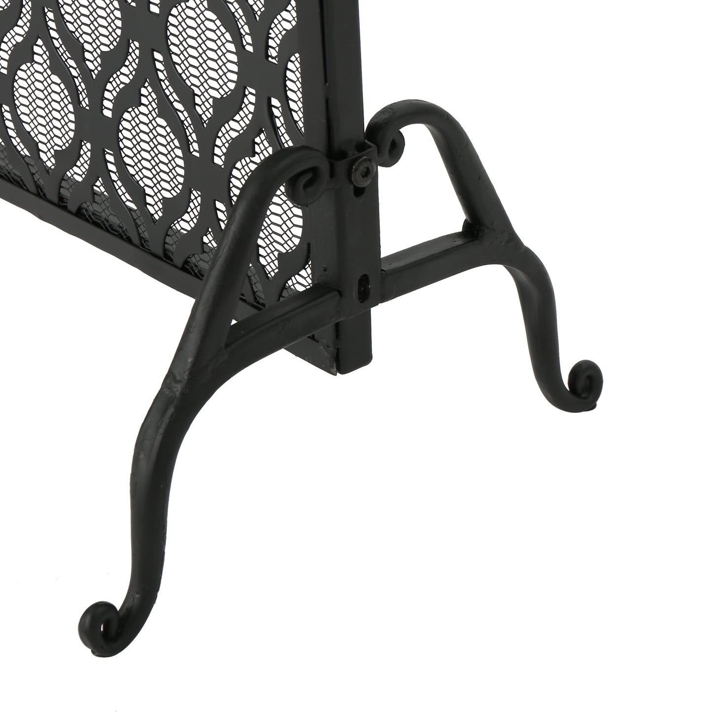 Black metal fireplace screen with decorative scroll legs