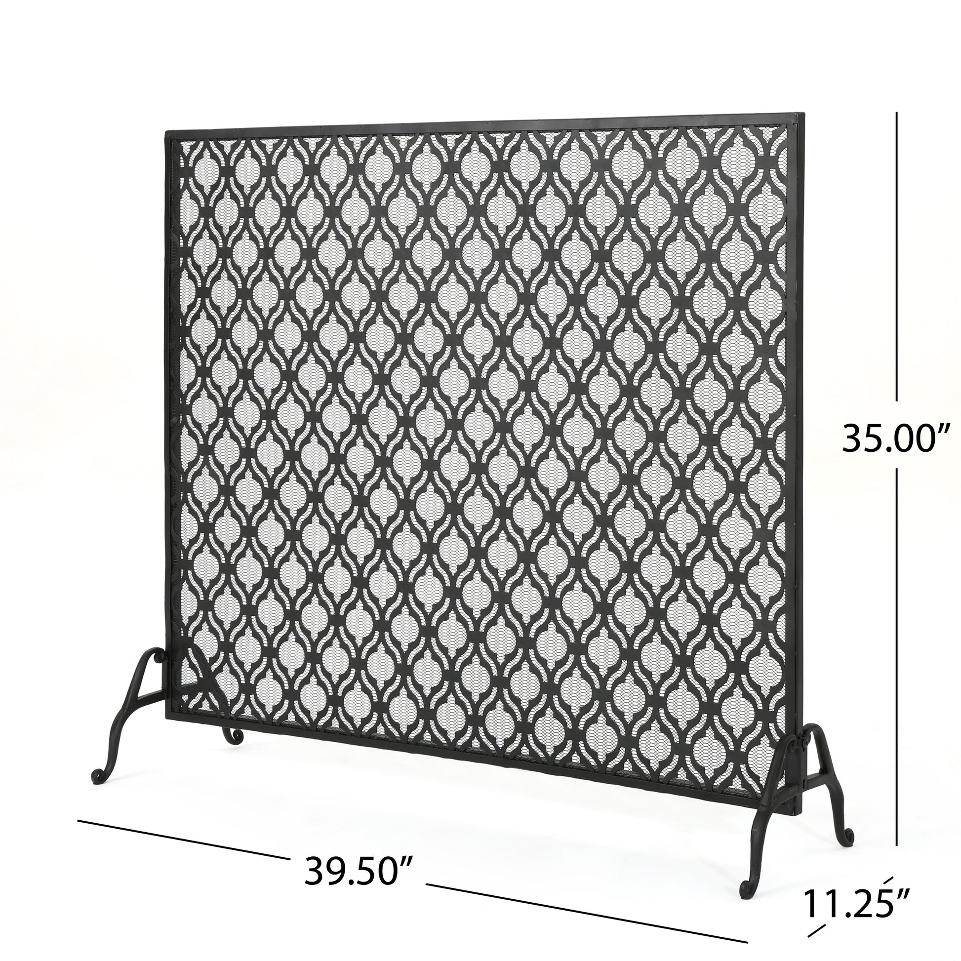 Black metal fireplace screen with decorative quatrefoil pattern