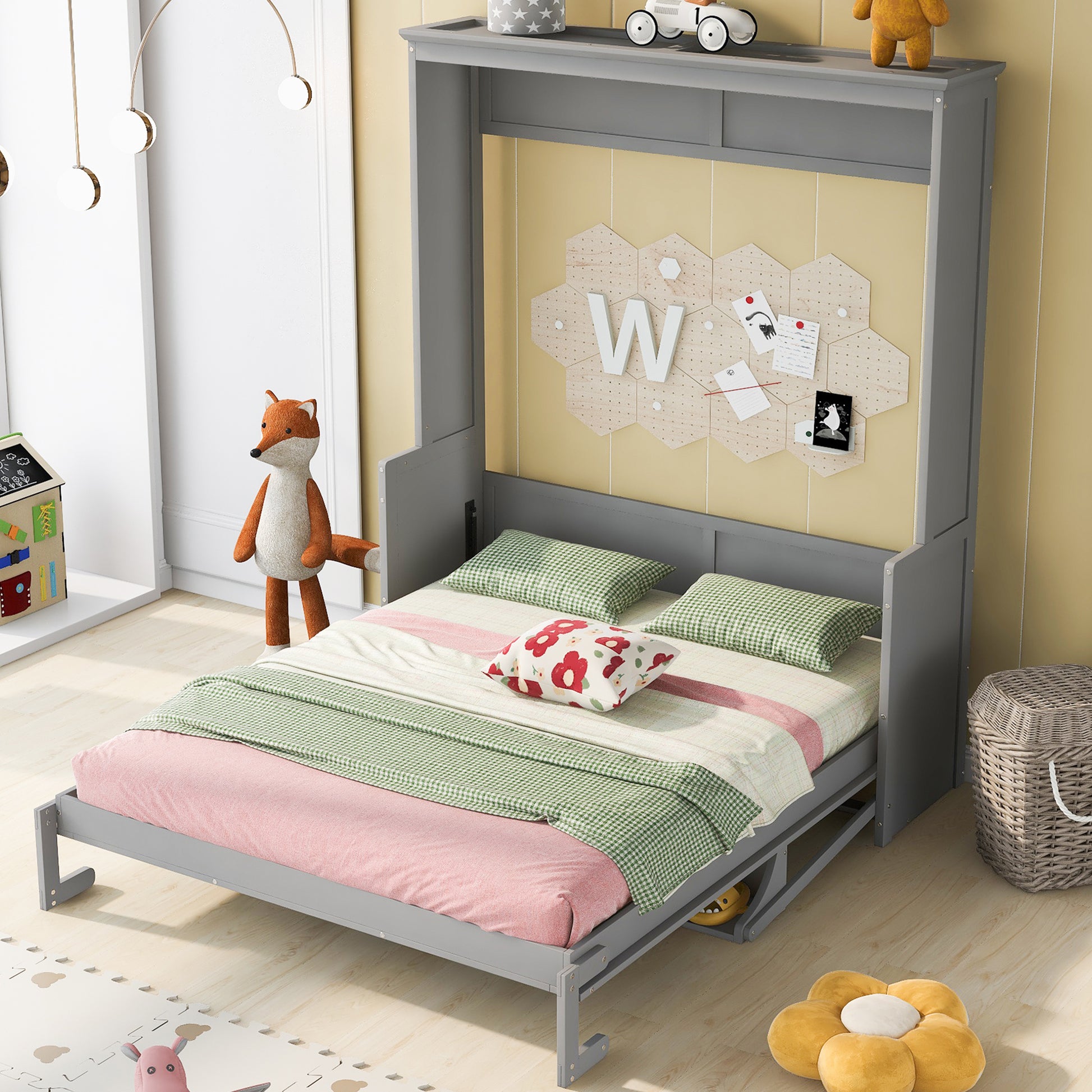 Gray murphy bed frame with queen mattress and green plaid bedding
