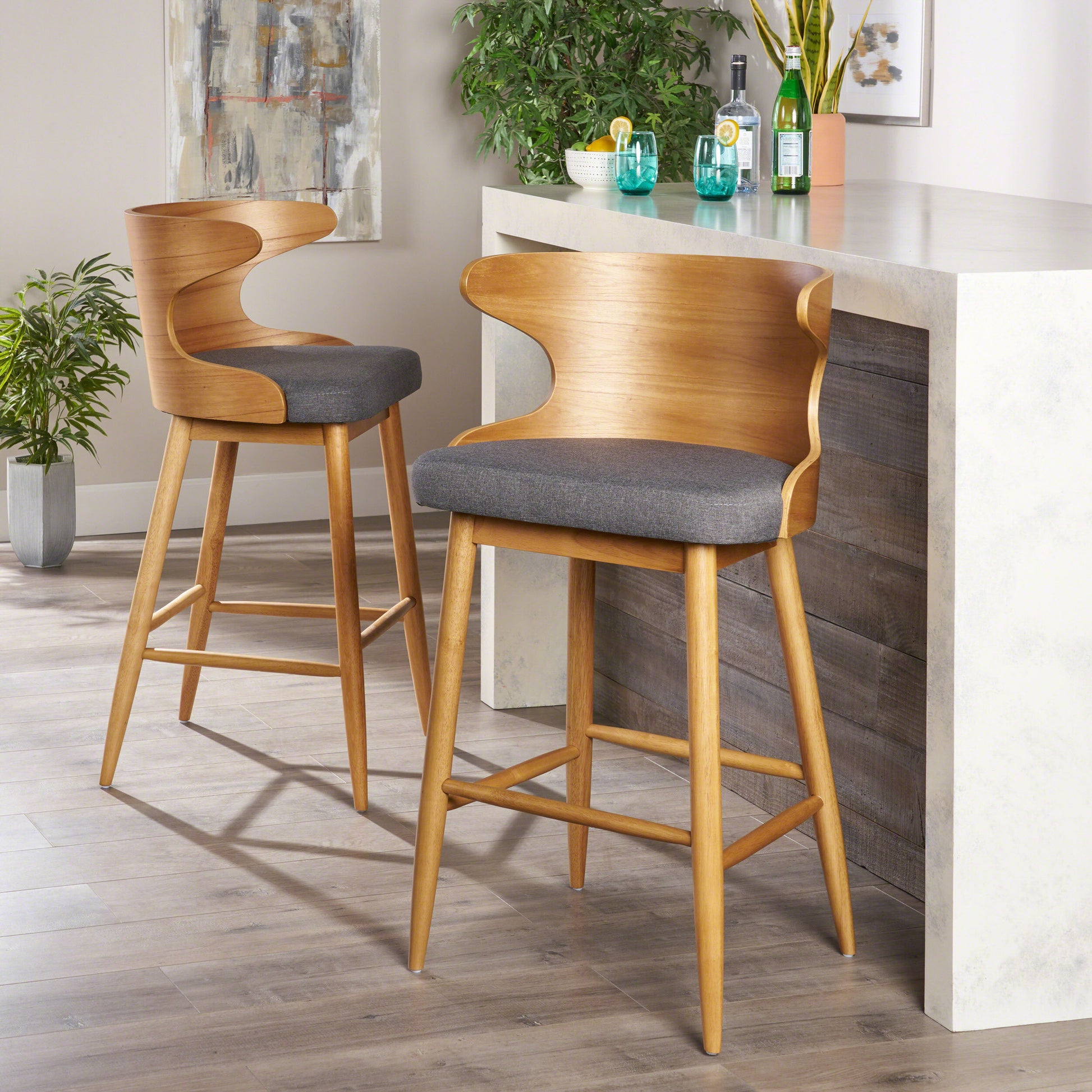 Wooden bar stool with curved back and grey upholstered seat