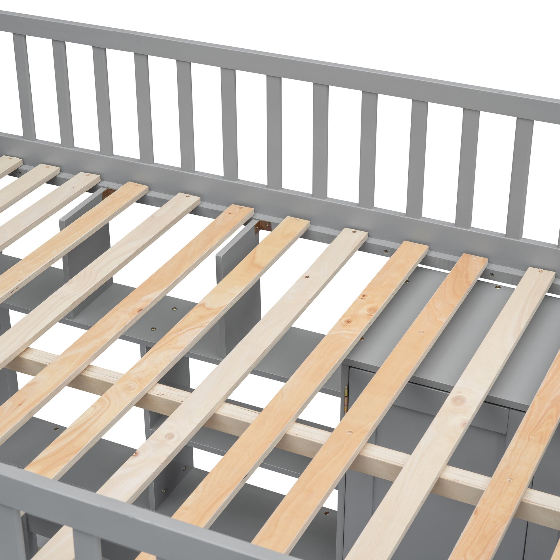 Gray wood slat bed frame showing interior storage compartments and wooden slats