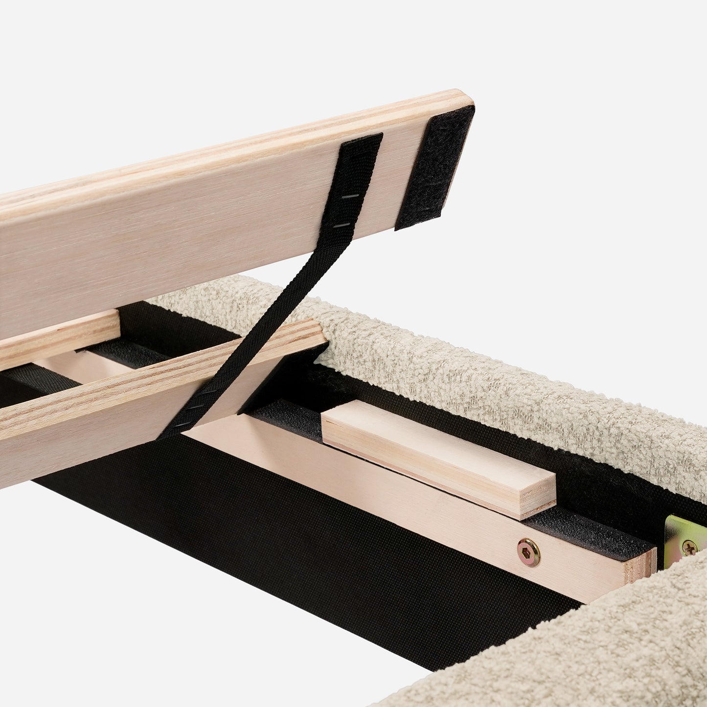 Wooden bed frame construction with black fabric webbing