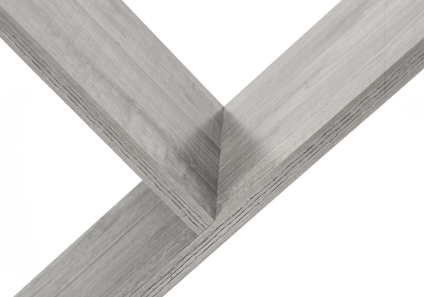 Closeup of distressed gray wood grain texture on shelf