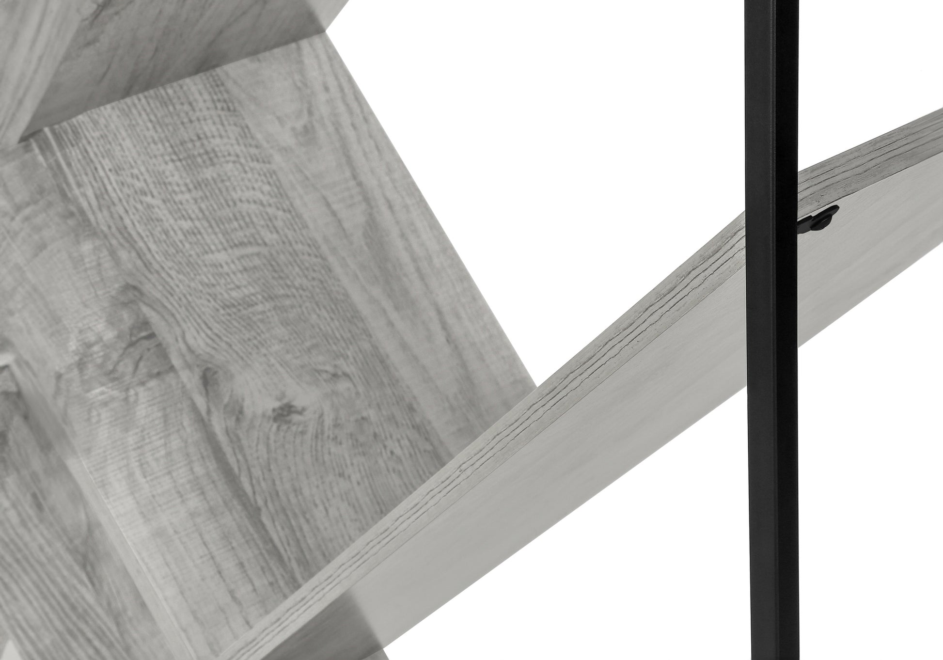 Closeup of a weathered grey wood bookshelf