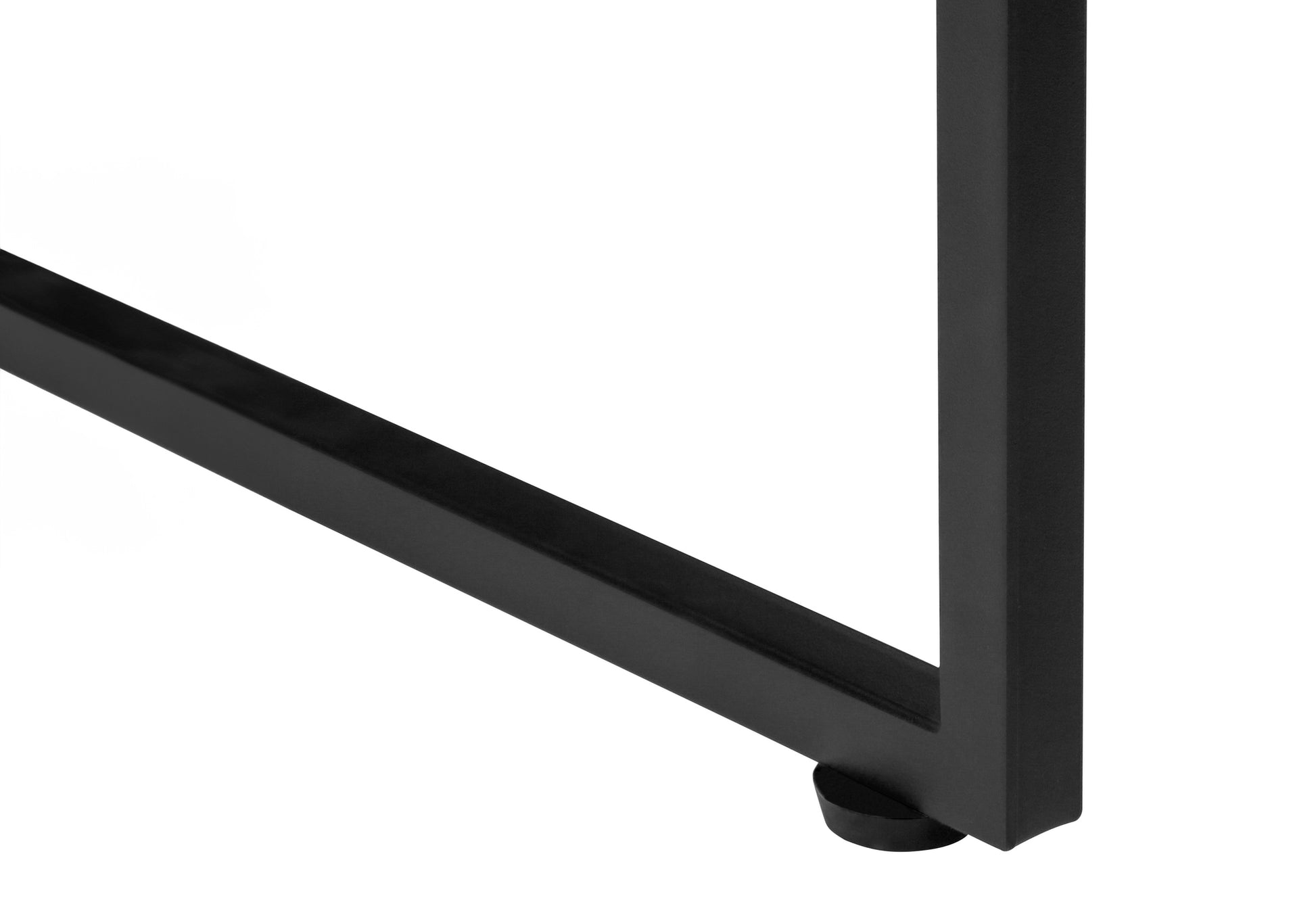 Black metal table leg detail with protective foot