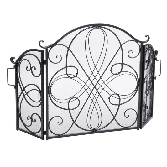 Black metal fireplace screen with ornate scrollwork and curved top