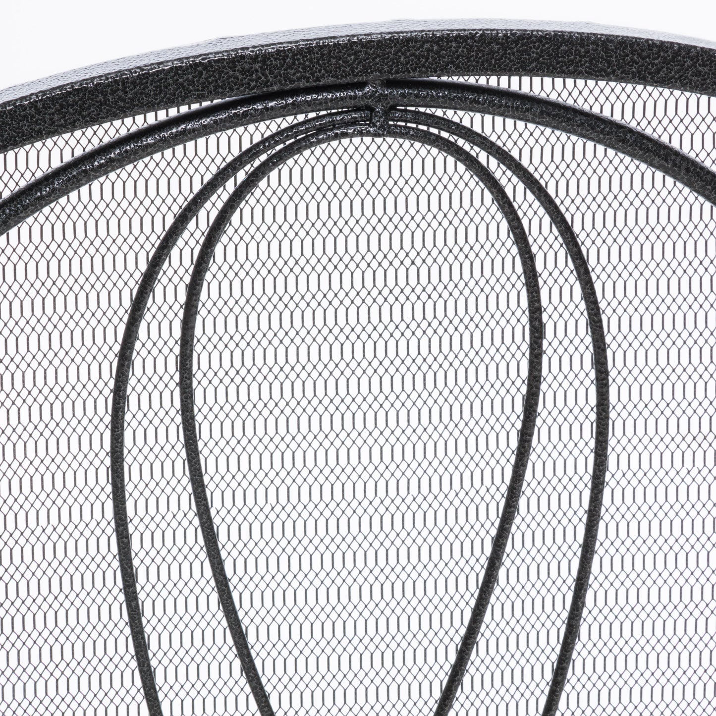 Closeup of intricate dark gray metal mesh with curved decorative bars Decorative fireplace screen detail