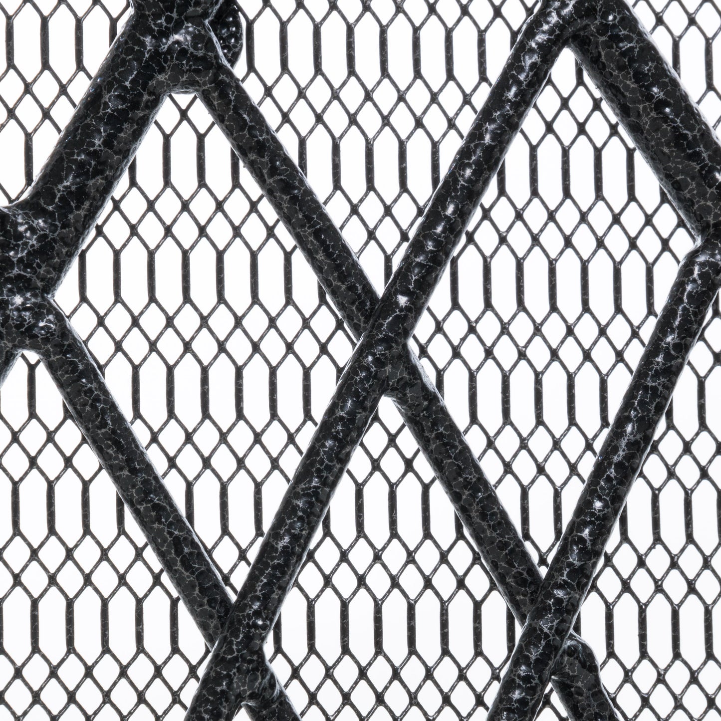 Black textured metal grate with diamond pattern