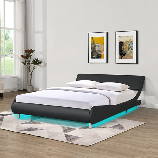 Black faux leather platform bed with integrated LED lighting and curved headboard
