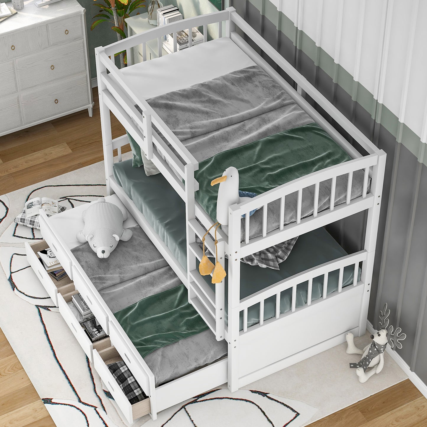 White wooden triple bunk bed with pullout trundle and storage drawers