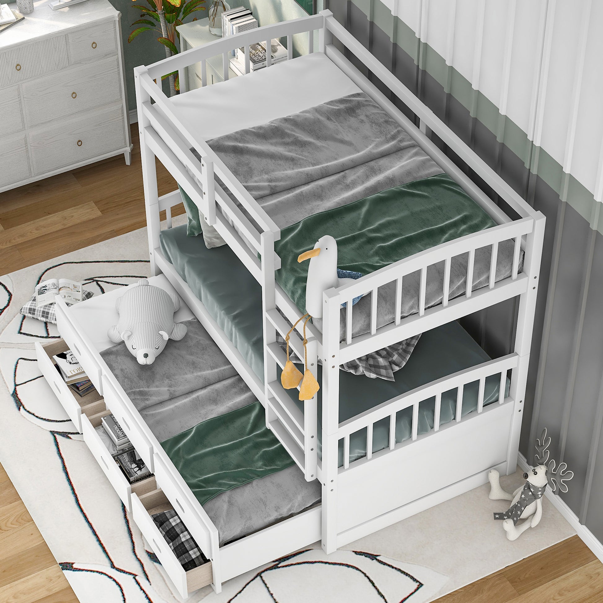 White wooden triple bunk bed with pullout trundle and storage drawers
