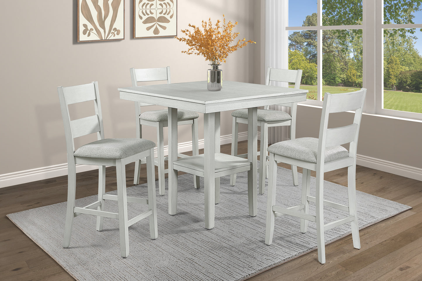 White distressed wood counter height table set with four upholstered stools