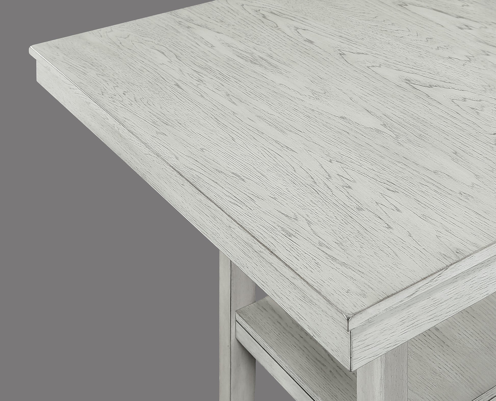 Closeup of whitewashed wood grain on a dining table top