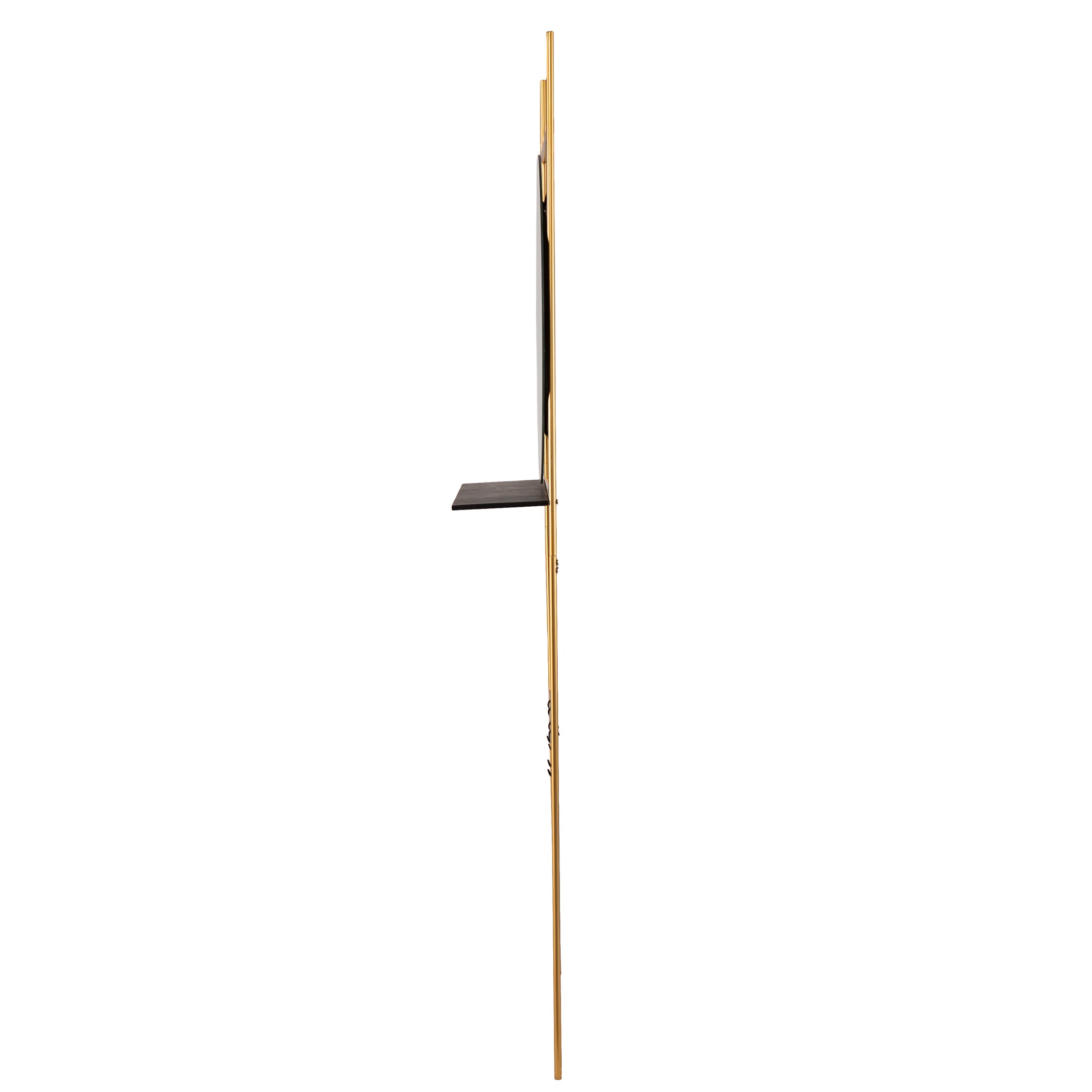 Gold metal wall shelf with decorative cutouts and black wooden accent piece