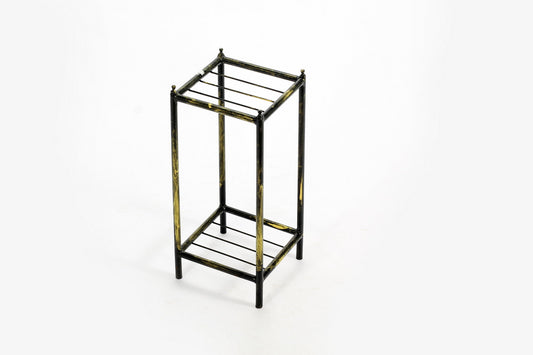Black and gold metal plant stand with two tiered shelves