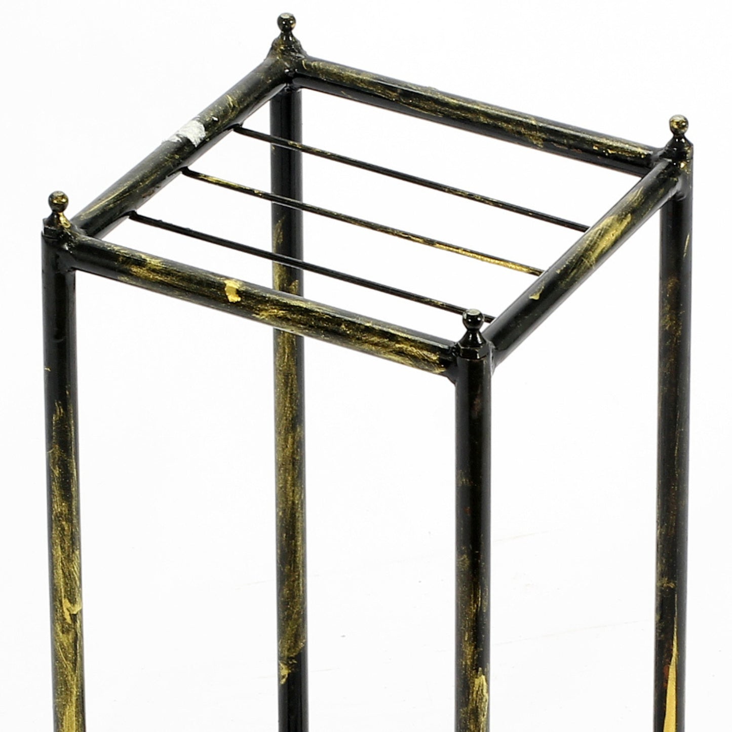 Black and gold wrought iron plant stand with spherical finials