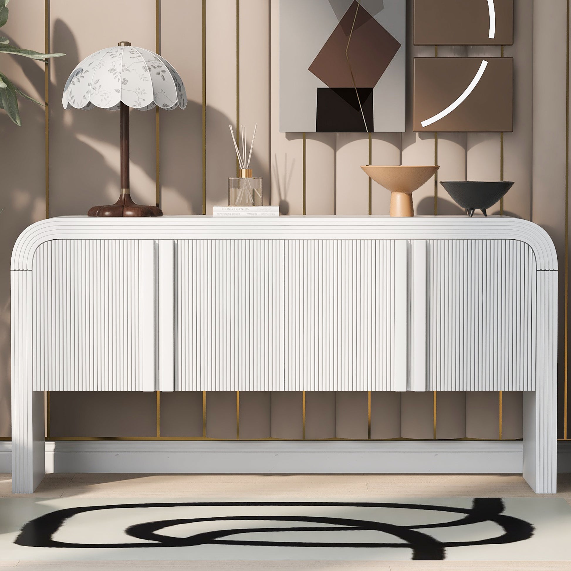 White fluted accent cabinet with rounded corners and gold accents
