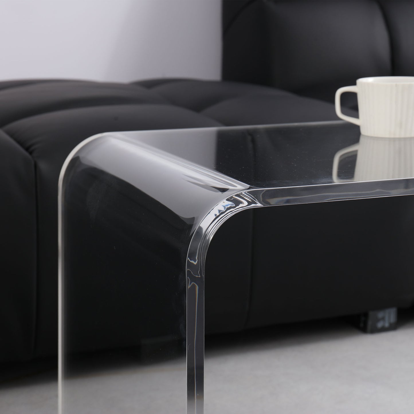 Curved acrylic coffee table