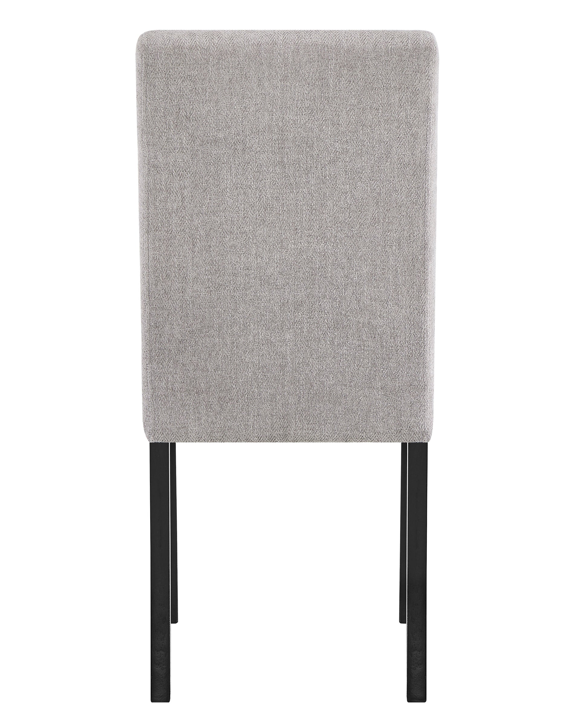 Back view of a textured light gray upholstered dining chair with black legs