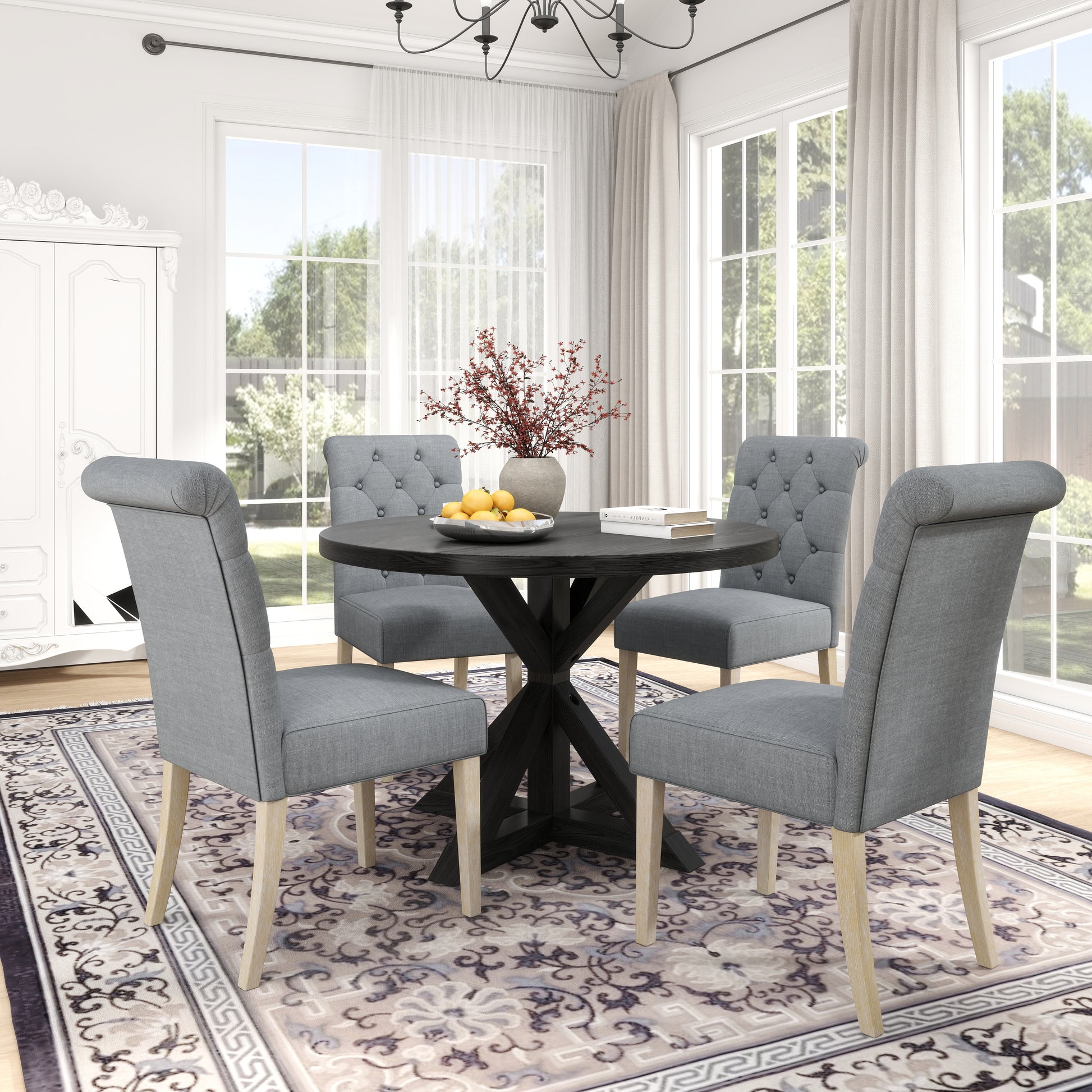 Gray upholstered tufted dining chair with wooden legs
