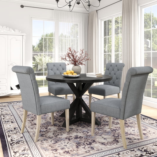 Gray upholstered tufted dining chair with wooden legs
