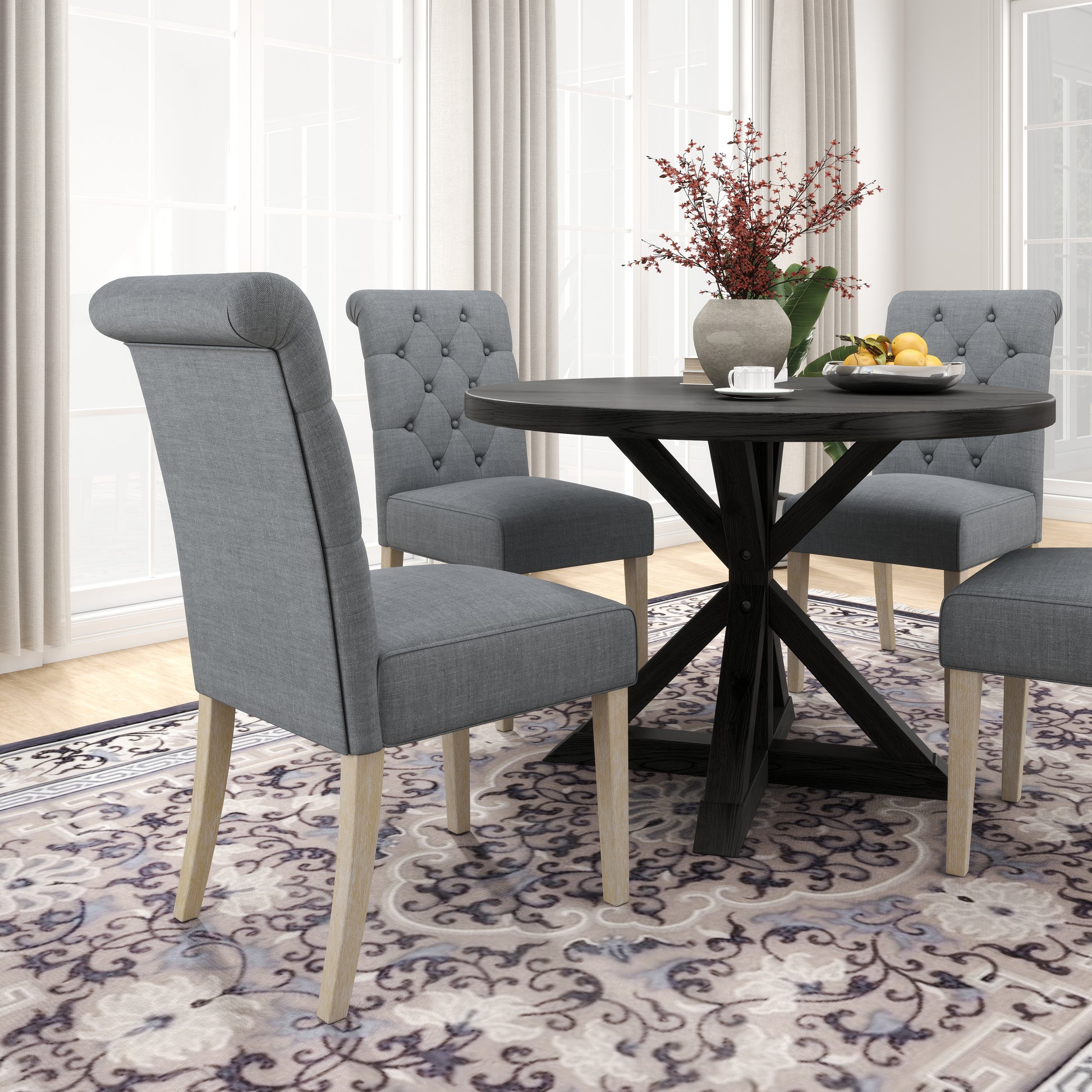 Tufted grey upholstered dining chair with natural wood legs