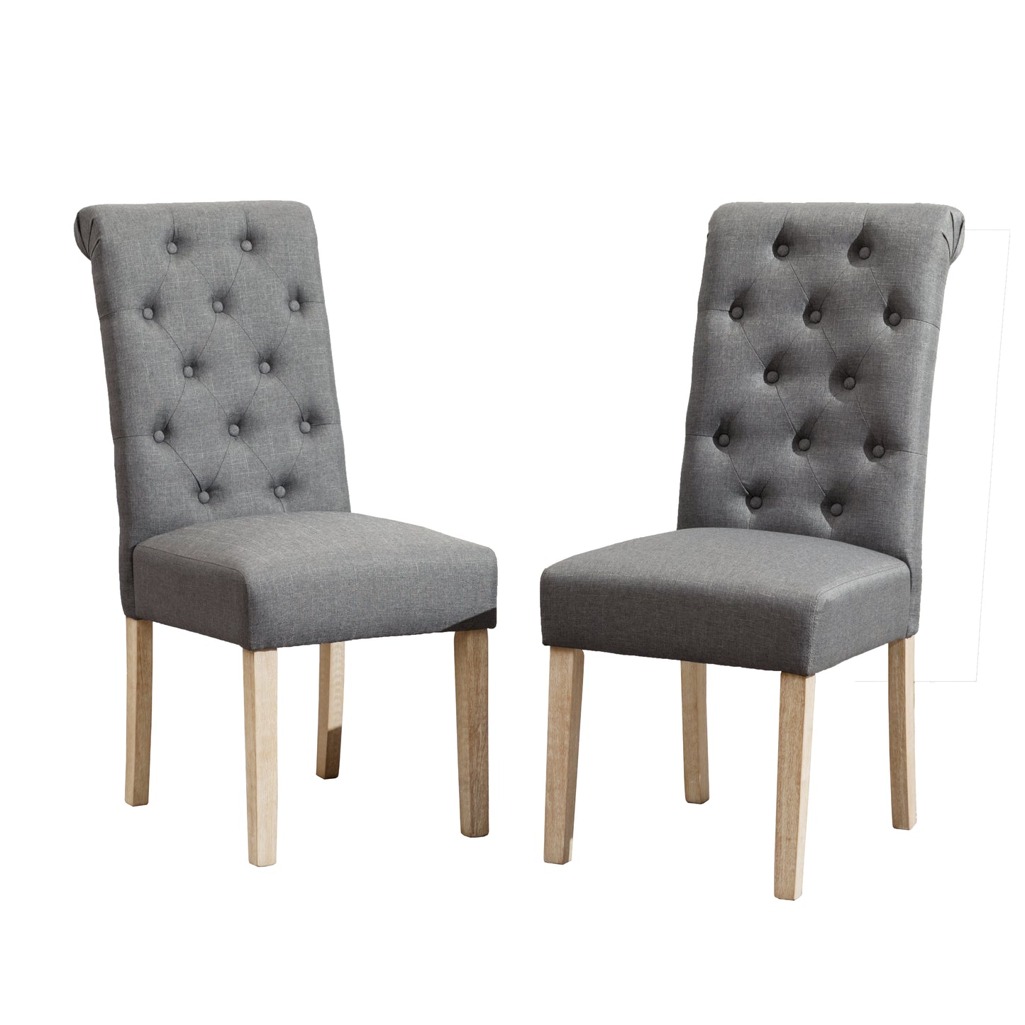 Two grey upholstered dining chairs with tufted backs and light wood legs