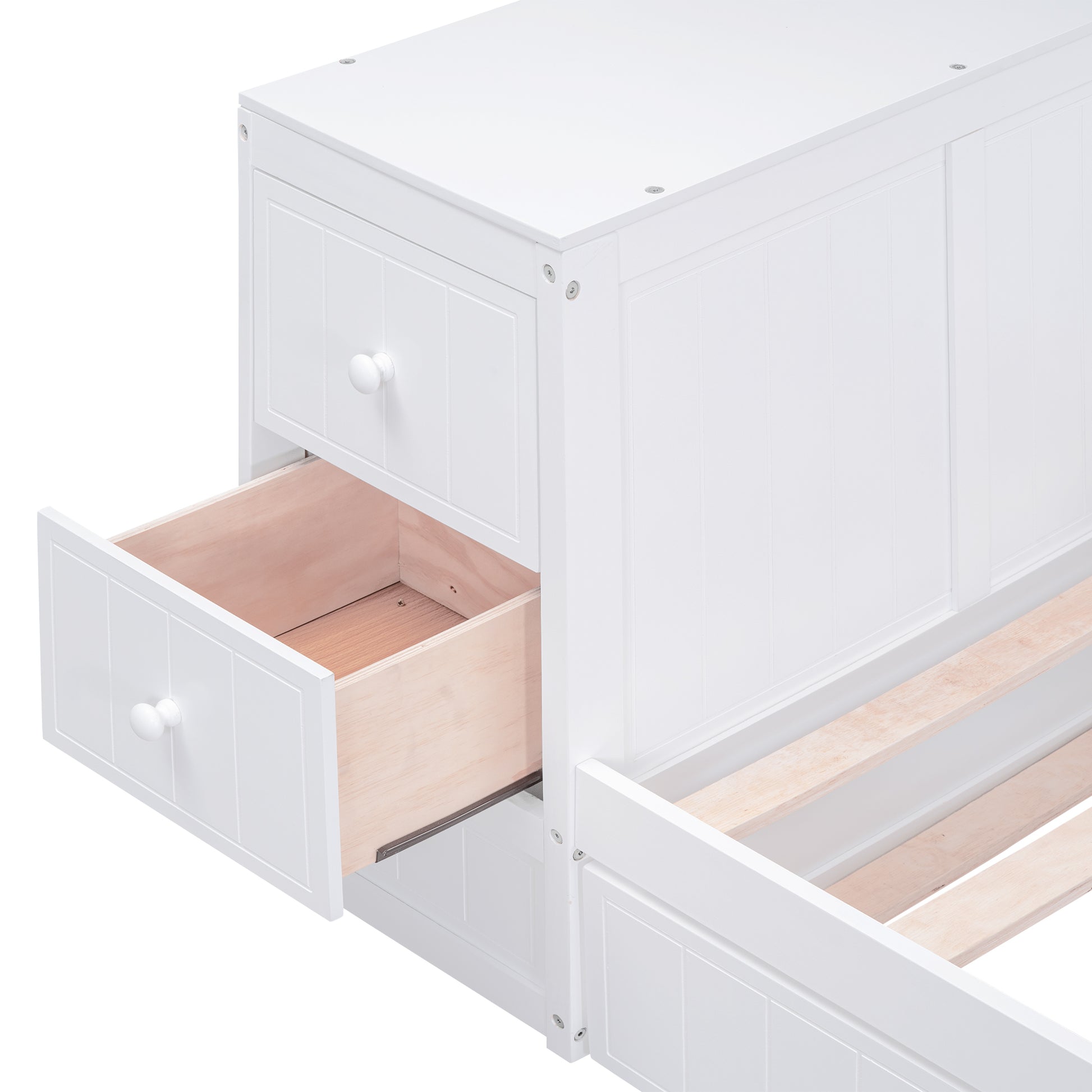 White wooden drawer unit with one drawer pulled out