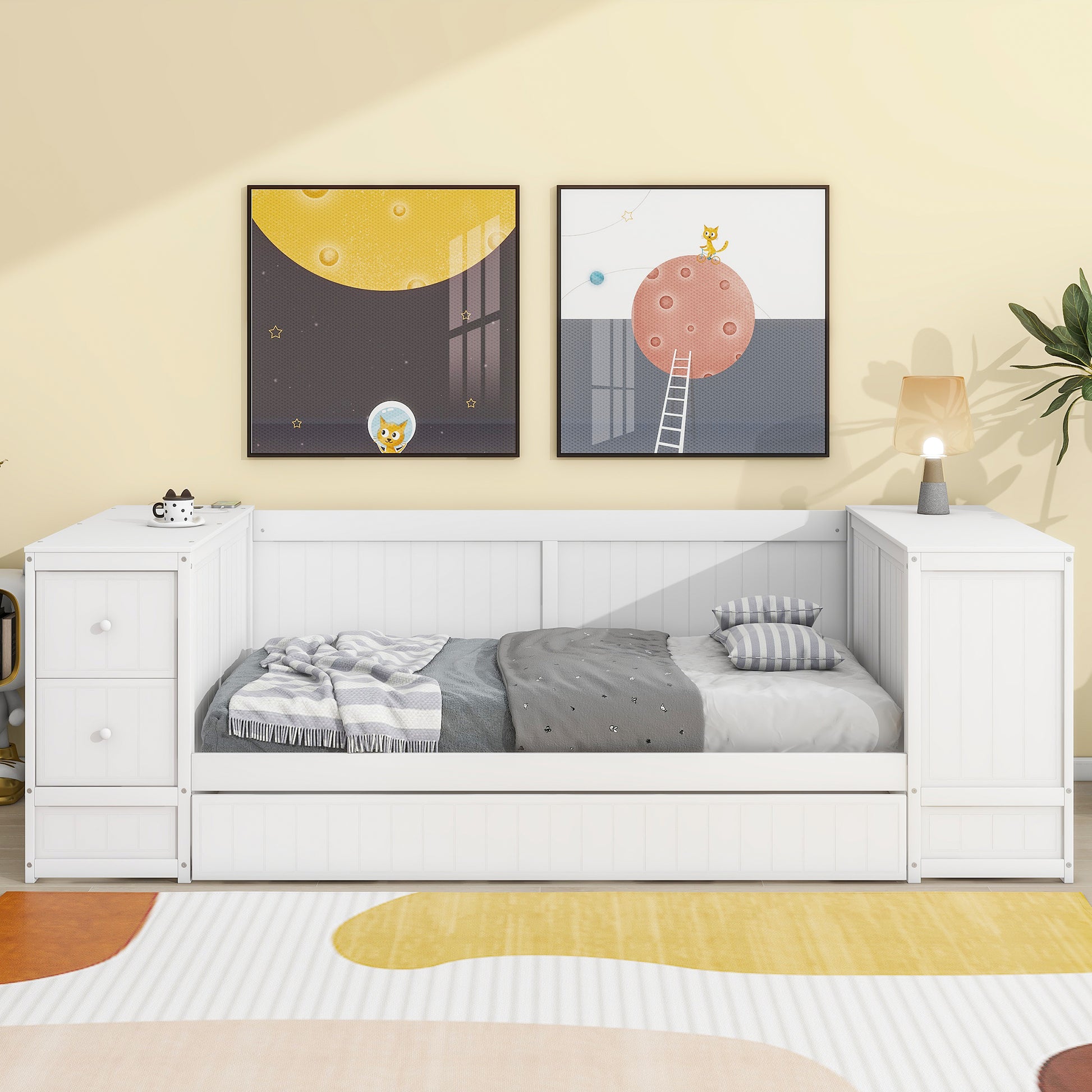 White toddler daybed with drawers and striped bedding featuring playful wall art
