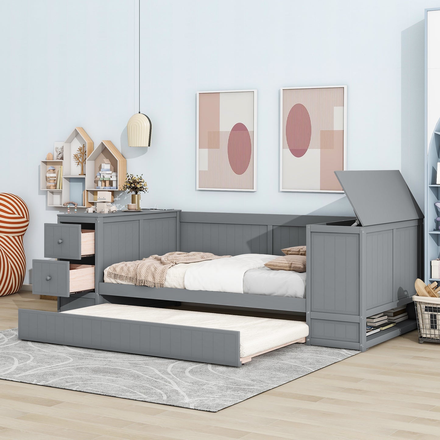 Gray wooden daybed with pullout trundle and storage drawers