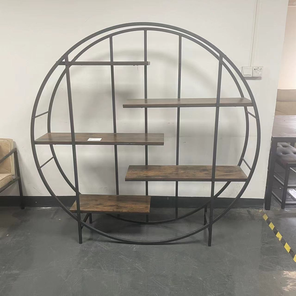 Circular metal shelving unit with rustic wood shelves perfect for displaying decor