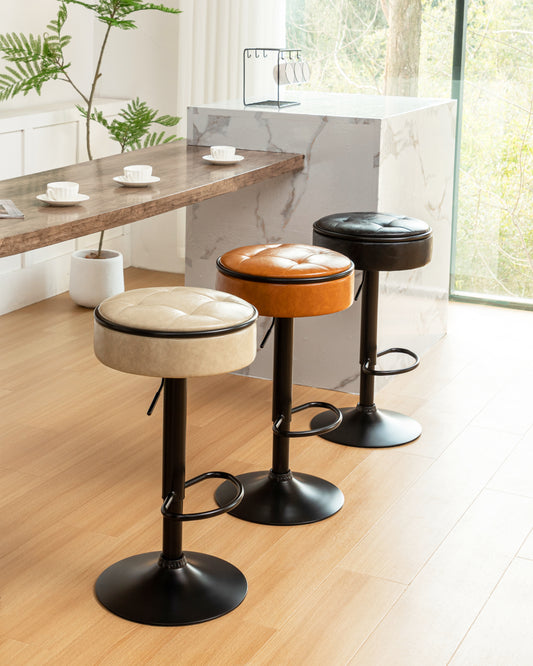 Adjustable height bar stool with beige tufted leather seat