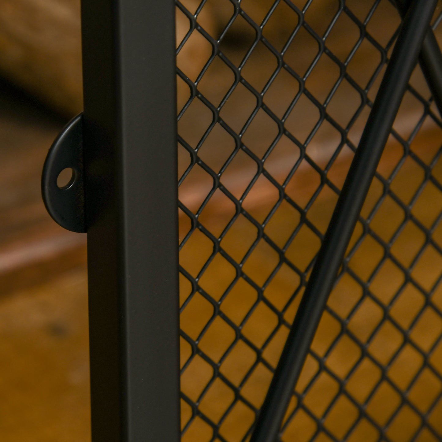 Black metal shelf bracket with diamond pattern mesh detail