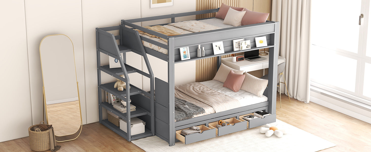 Gray metal twin over twin bunk bed with stairs and drawers