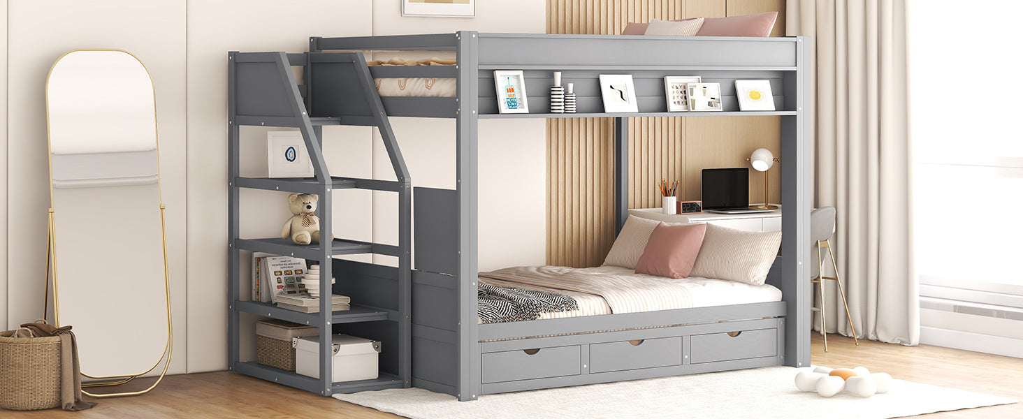 Gray wooden bunk bed with desk and drawers
