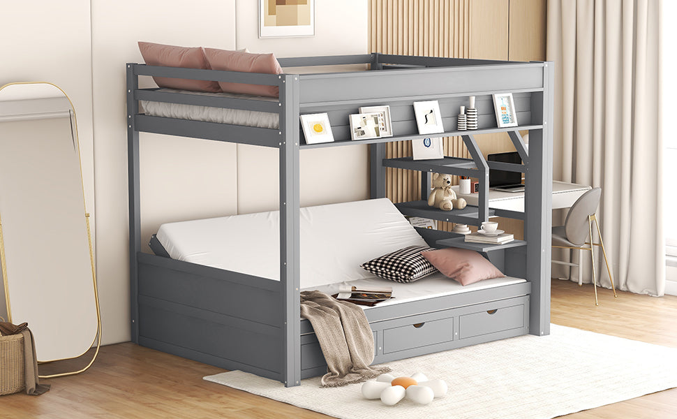 Gray wooden twin over twin bunk bed with integrated desk and storage shelves