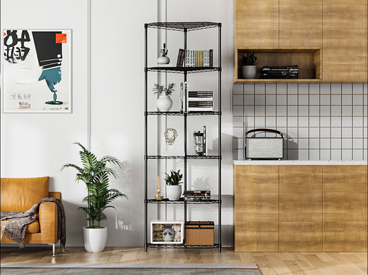 Black tier wire shelving unit with books and decor