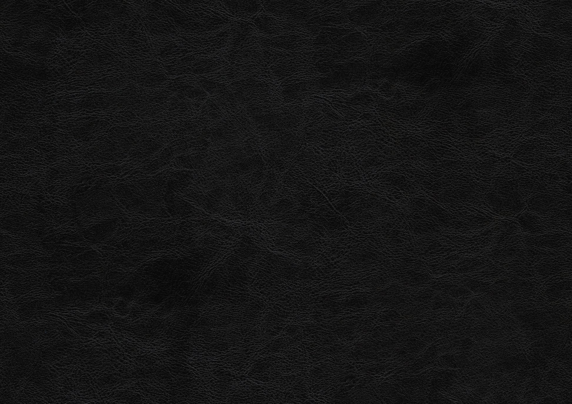 Textured black faux leather material sample with a matte finish