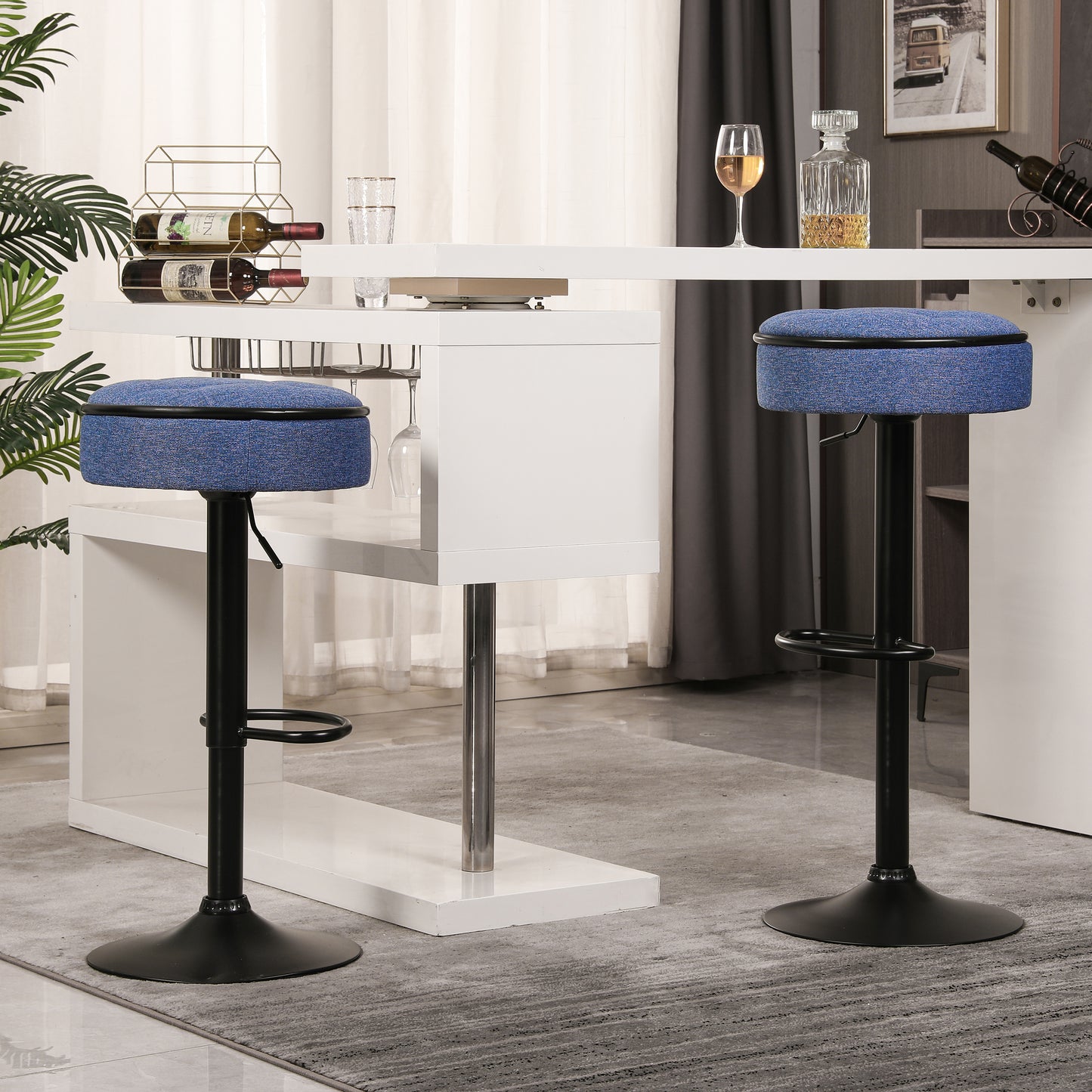Blue fabric upholstered adjustable height bar stool with black base