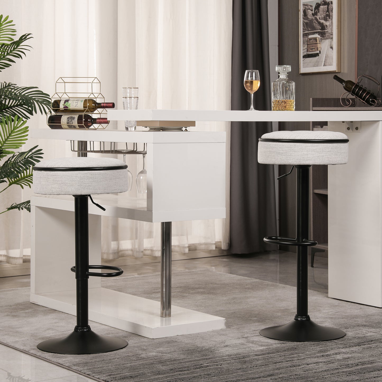 Gray upholstered adjustable bar stool with black base