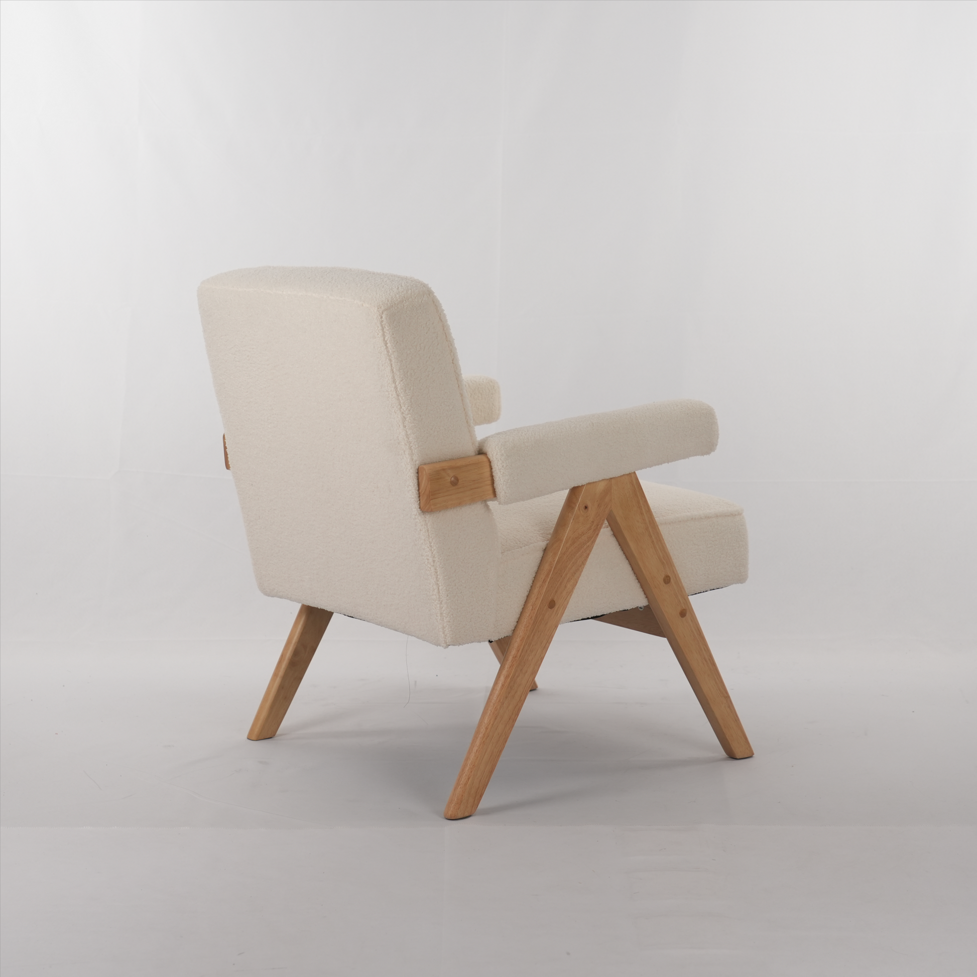 Cream boucle accent chair with natural wood frame