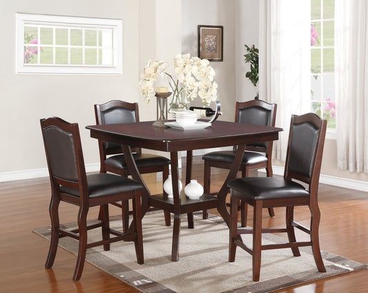 Dark wood counter height dining table with four faux leather chairs