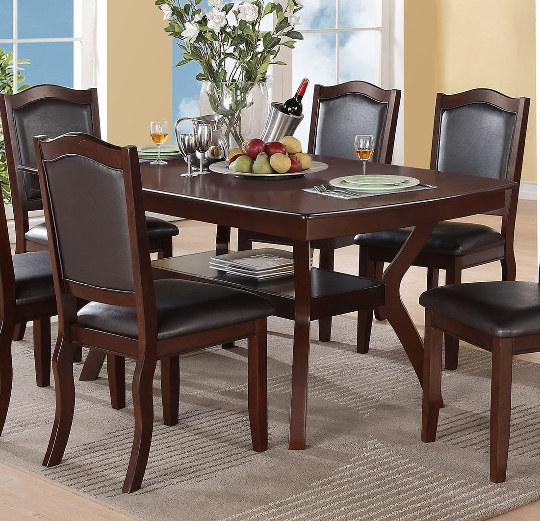 Dark wood dining table with black faux leather chairs