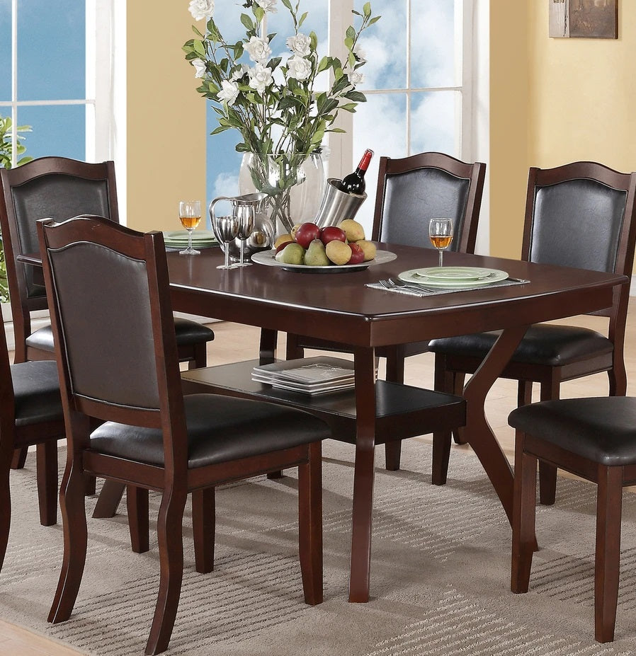 Dark wood dining table with upholstered chairs
