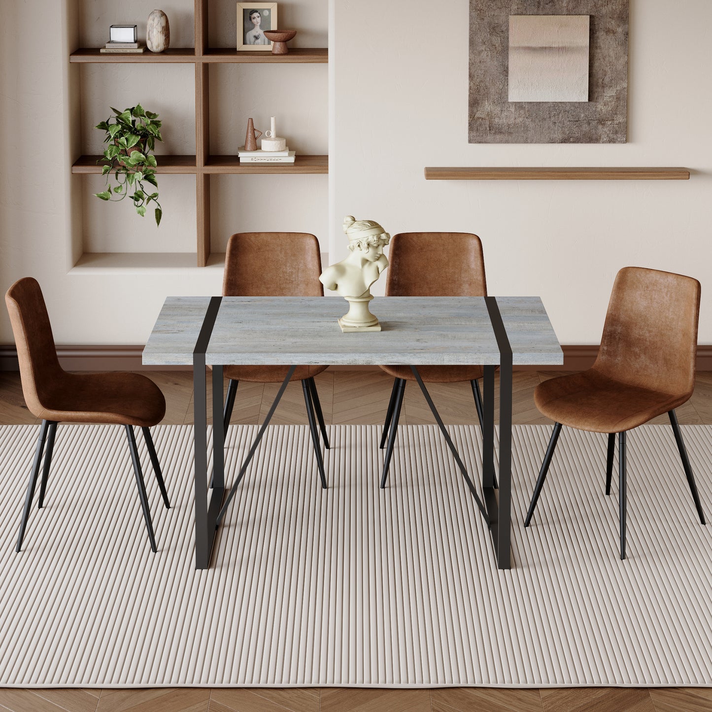 Rustic grey wood dining table with black metal legs and modern brown faux leather chairs