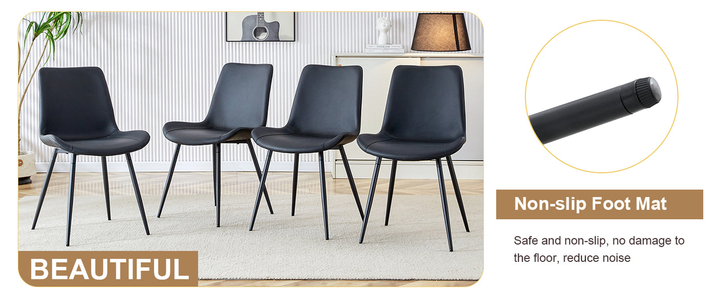 Set of four black faux leather dining chairs with metal legs
