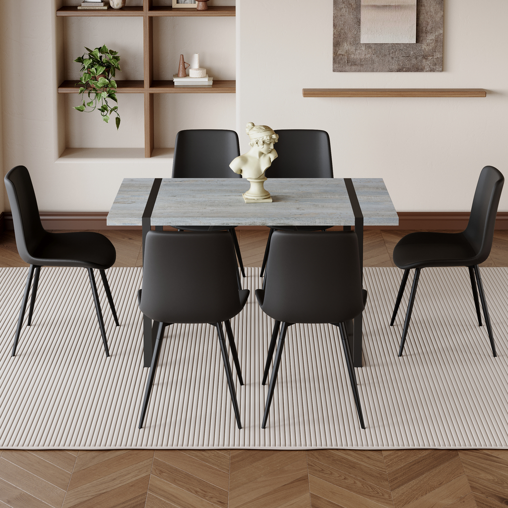 Modern grey wood dining table with black metal legs and six black chairs