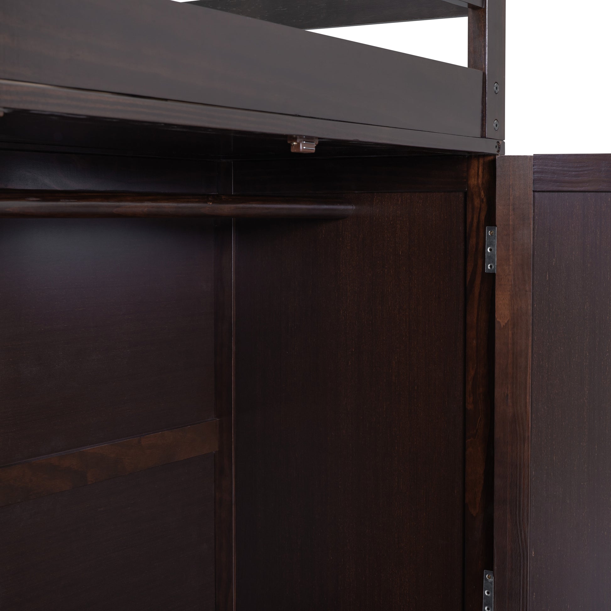 Dark wood loft bed interior with hanging rod